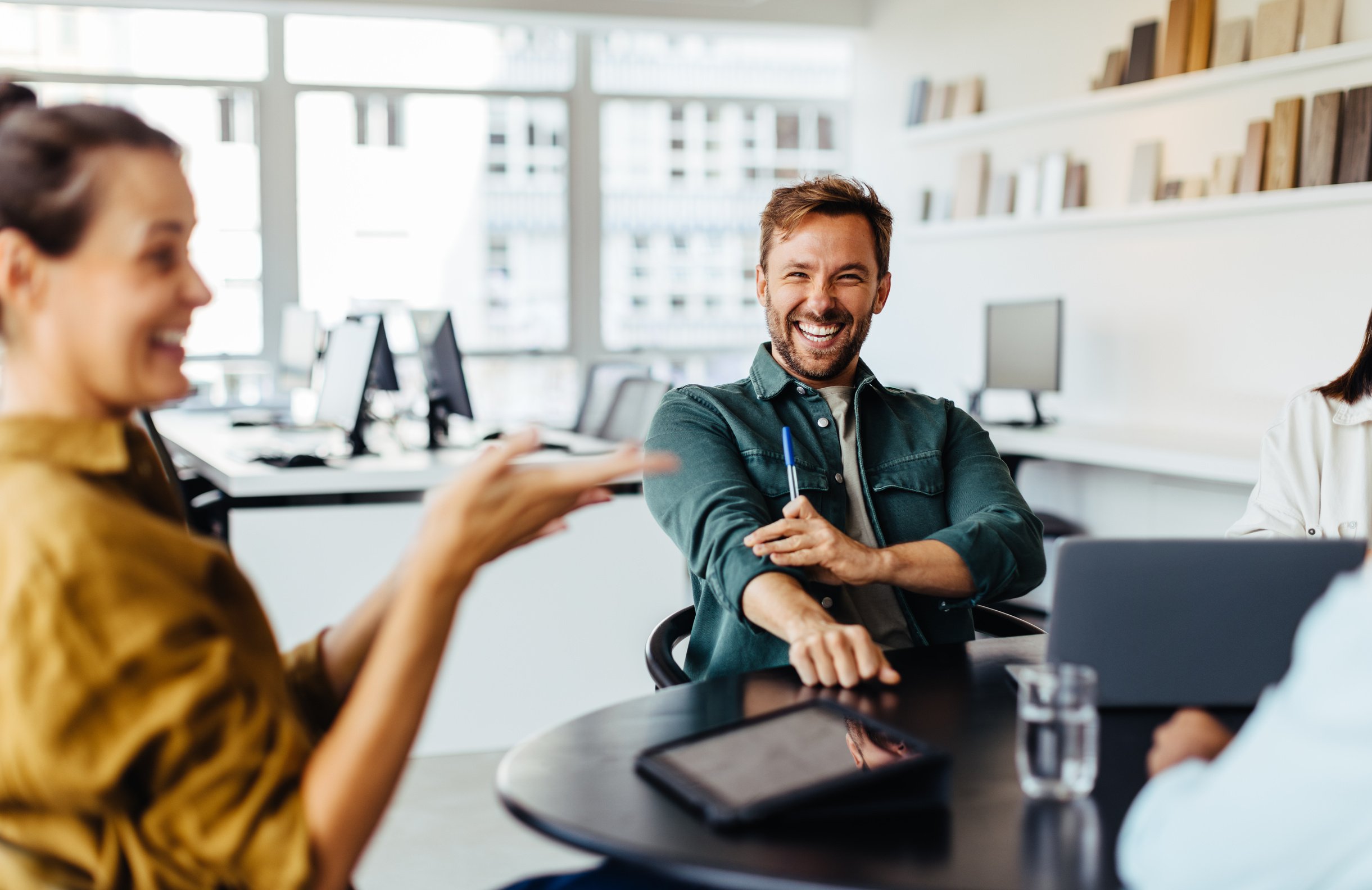 Business people having a team meeting in an office