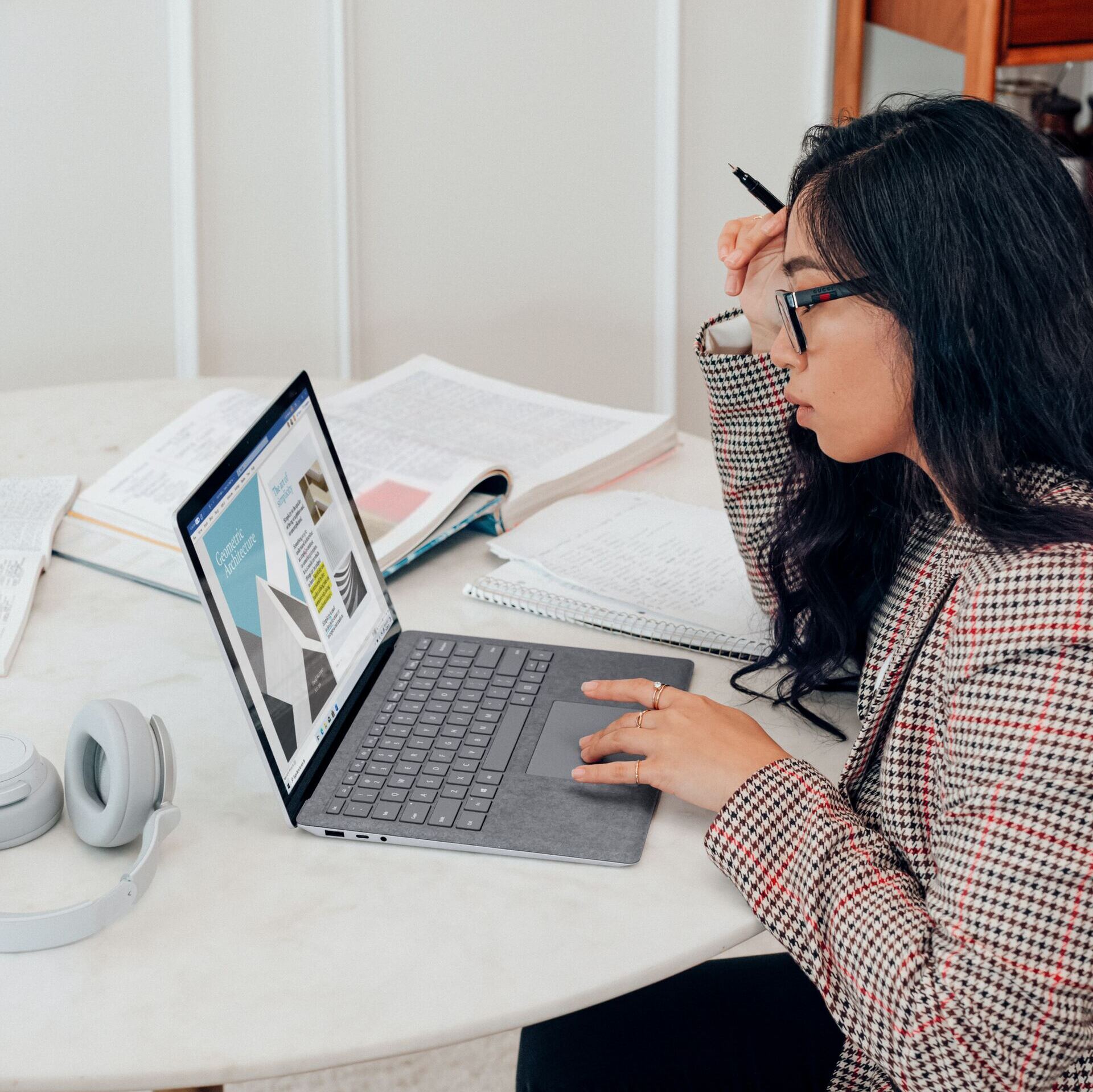 woman in blazer using Omnia software